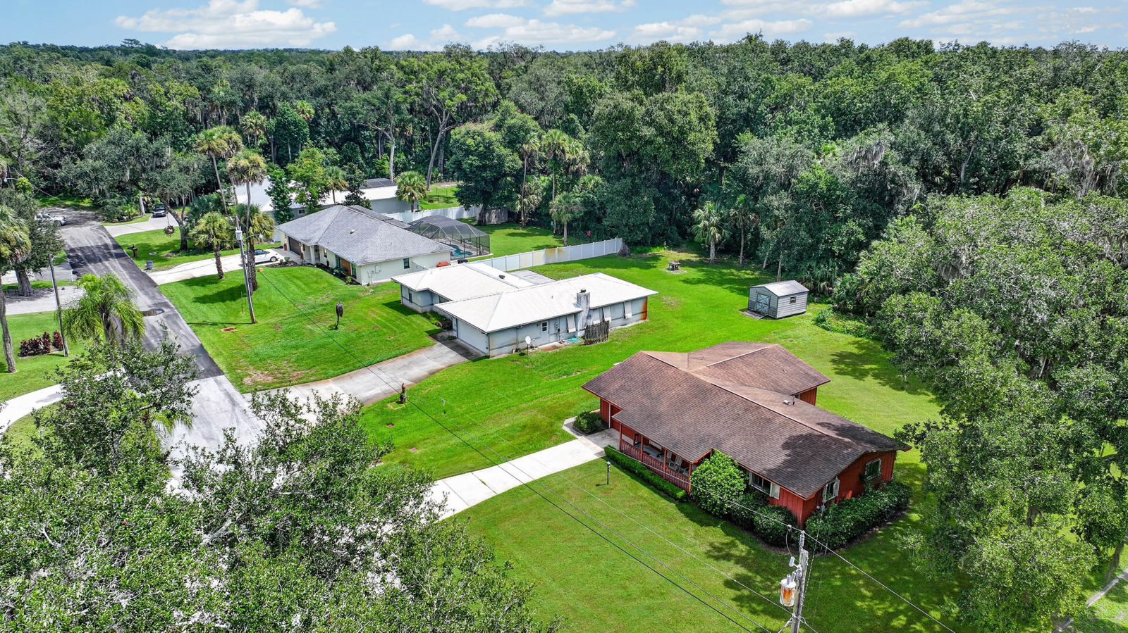 Aerial view of the home and surrounding grounds